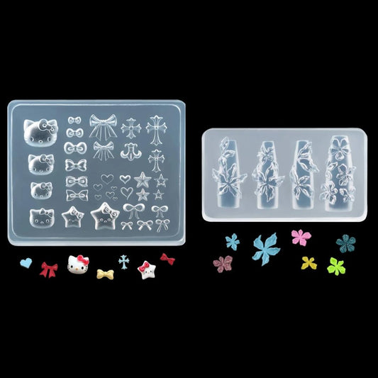 Two clear silicone molds with various shapes on a black background