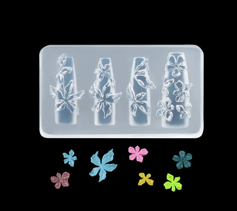 Silicone mold with floral designs on a black background