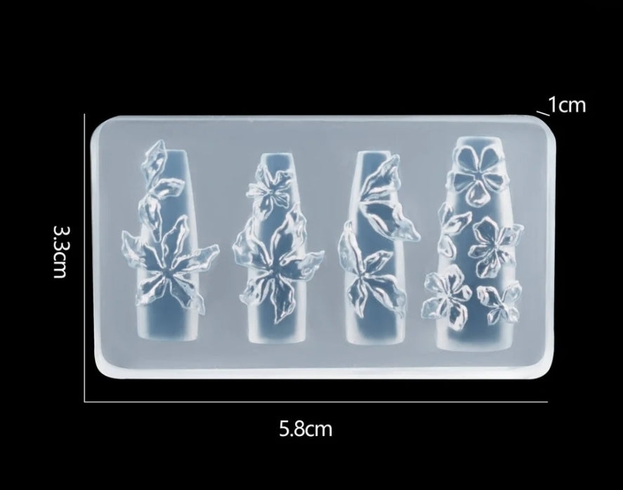 Silicone mold with floral designs on a black background